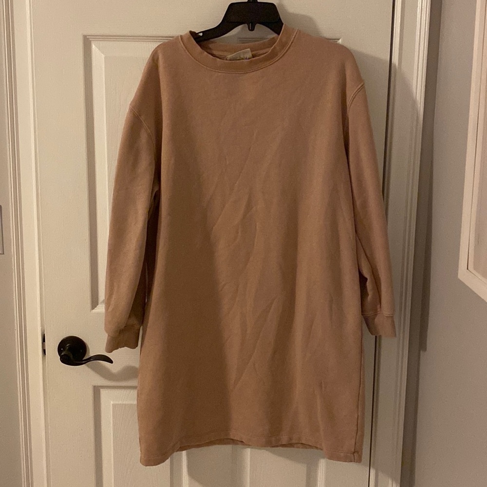 This is a sweatshirt dress from target. It fits true to size and is very warm.
